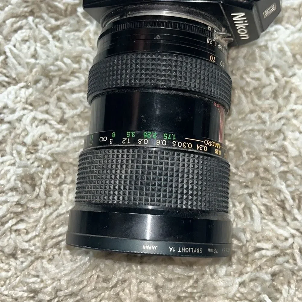 Vintage Nikon EM, interchangeable lenses, 35mm Single SLR F = 28–70 MM Marco Len